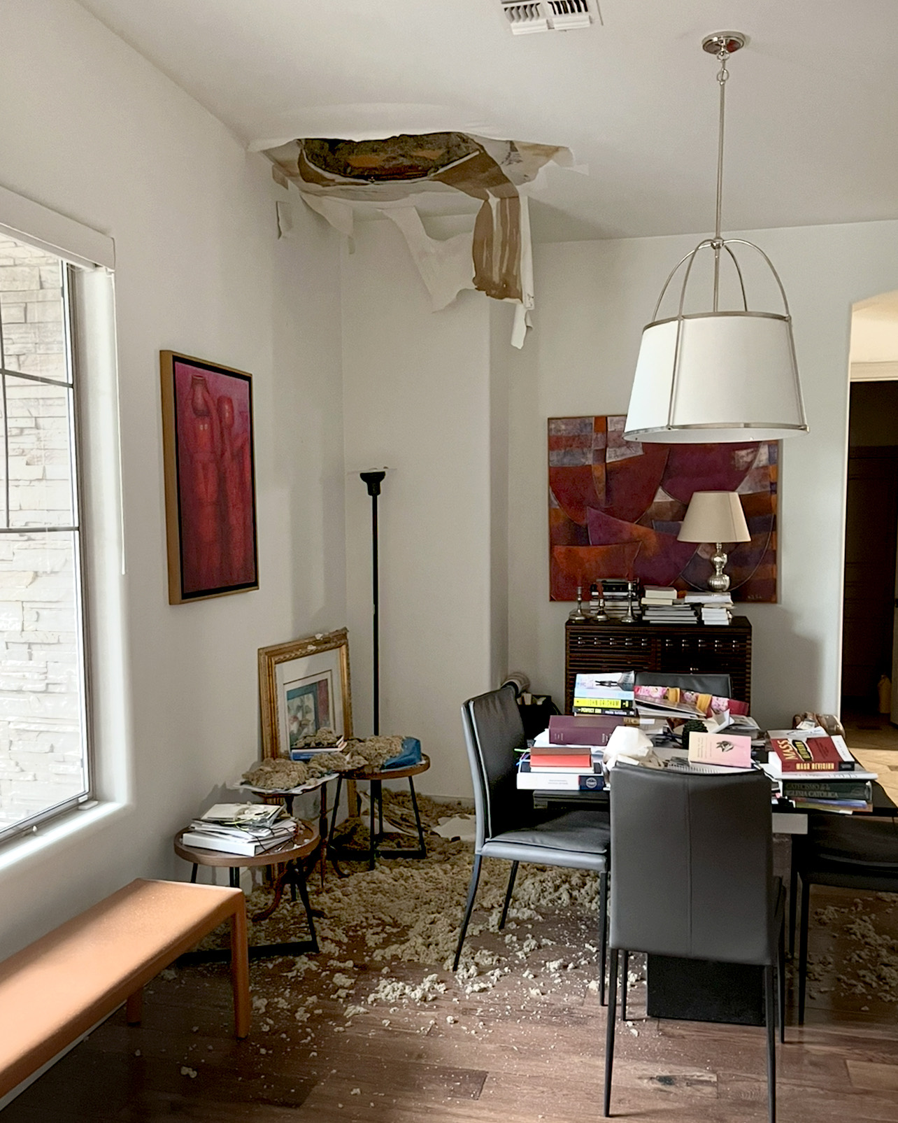 Dining room ceiling damage before the contained repair.